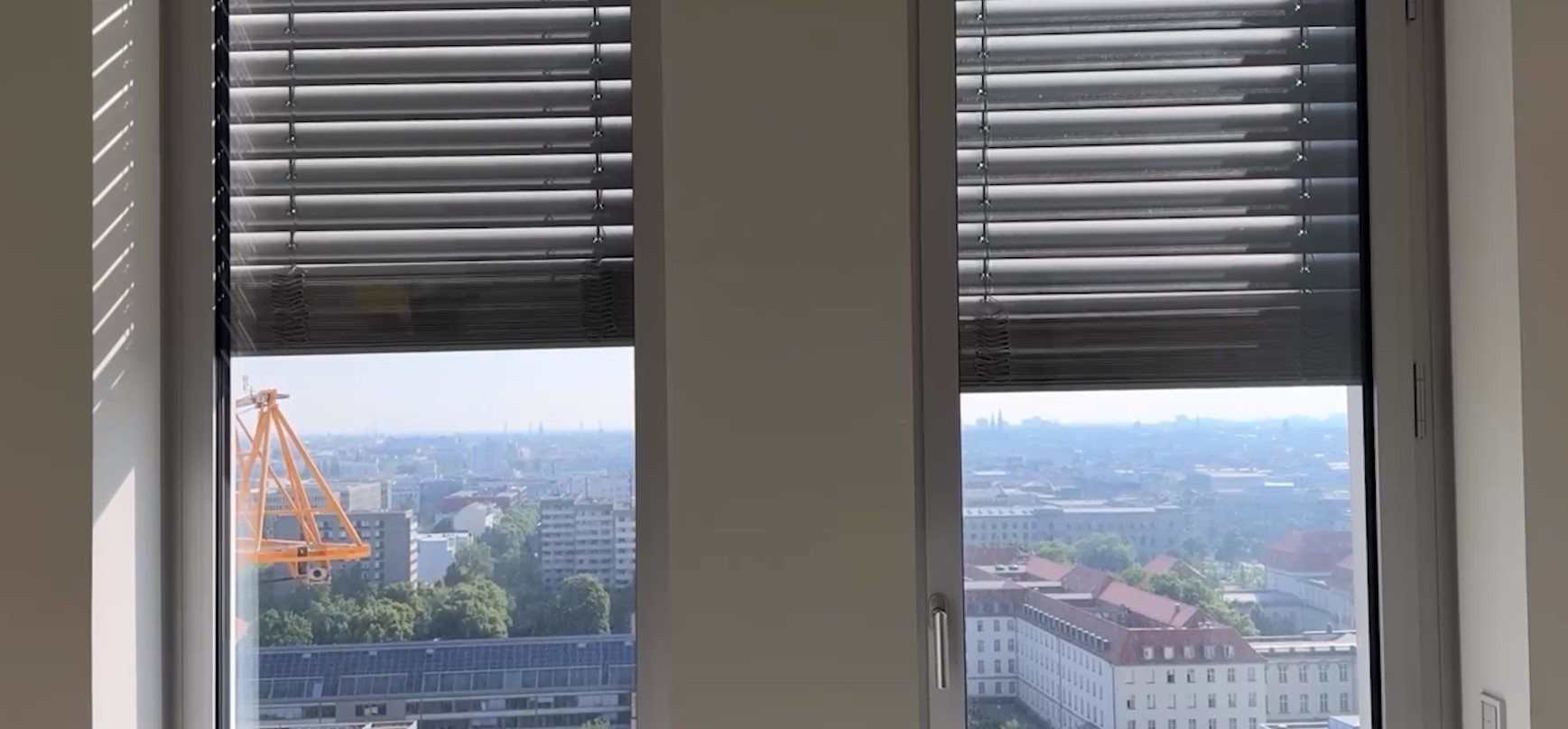 blinds rolling up using motorization on a window